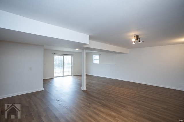 basement with dark wood-type flooring