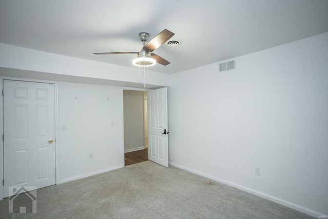 unfurnished bedroom featuring carpet flooring and ceiling fan