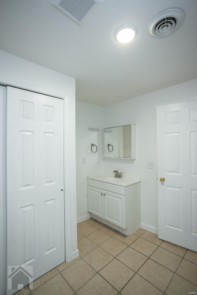 bathroom featuring vanity and tile patterned floors