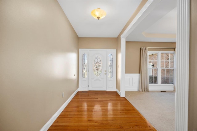 foyer entrance with light wood-type flooring