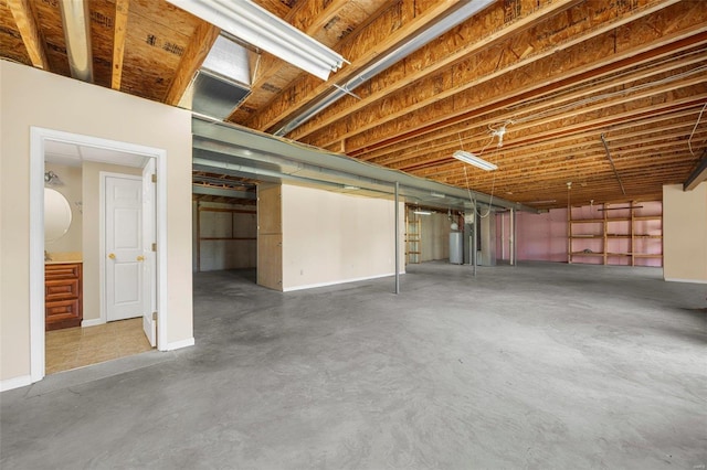 basement featuring water heater