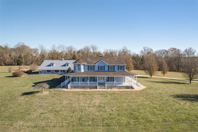 rear view of property with a porch and a yard