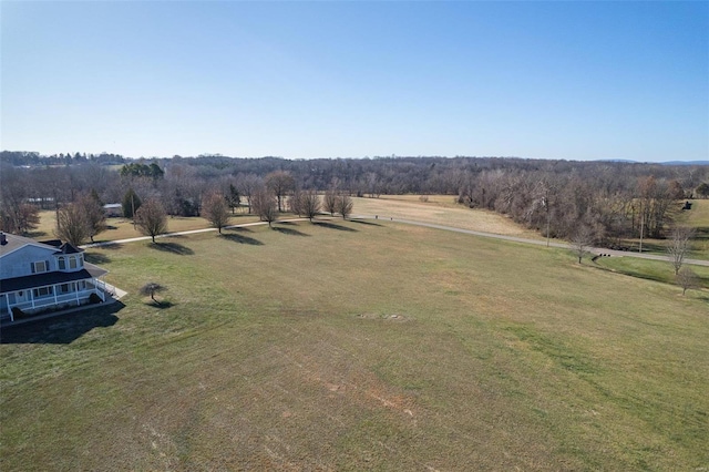 birds eye view of property featuring a rural view