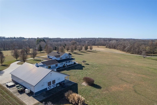 birds eye view of property featuring a rural view