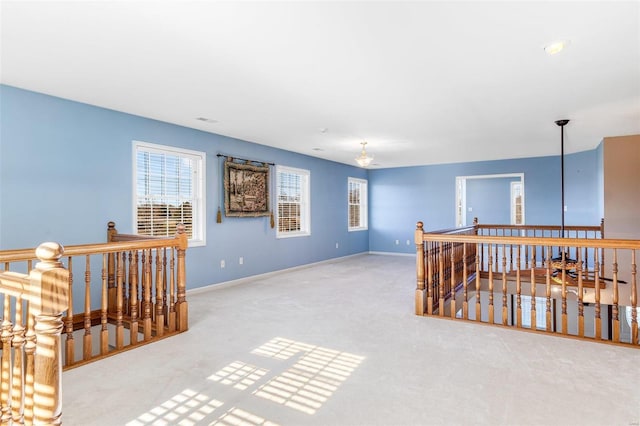 empty room featuring carpet flooring