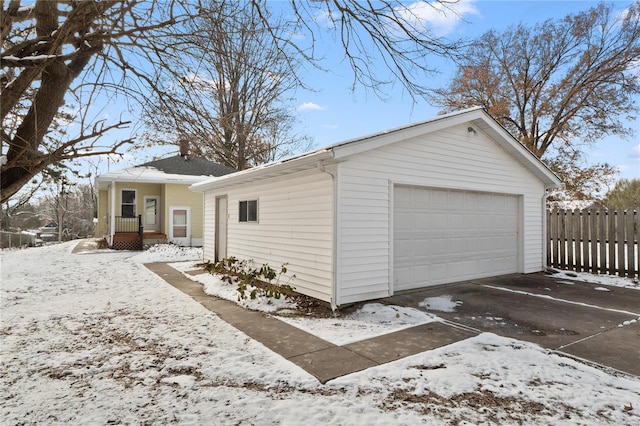 view of snow covered garage