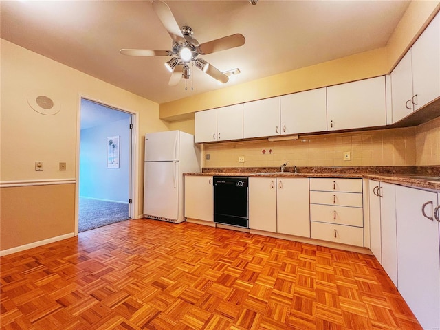 kitchen with dishwasher, white refrigerator, and white cabinetry