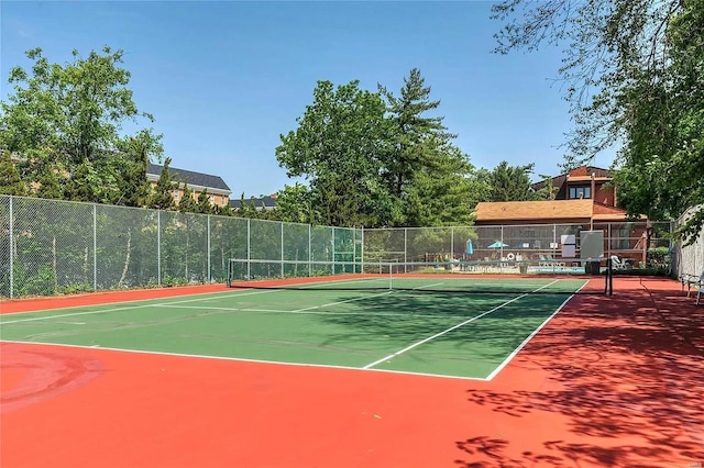 view of tennis court with basketball court