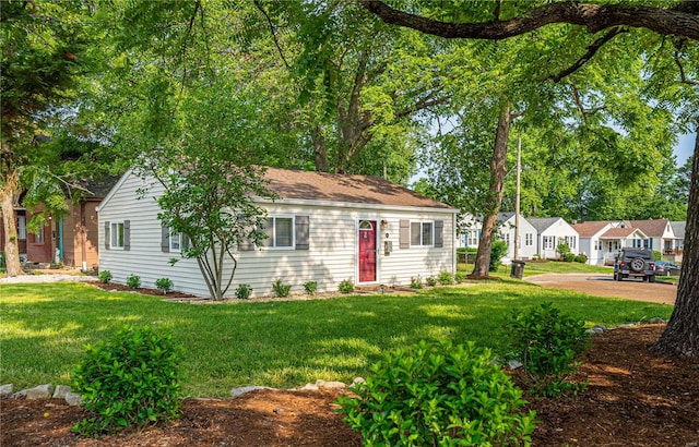 view of front of home with a front yard