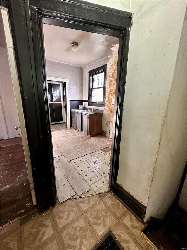 bathroom featuring parquet floors