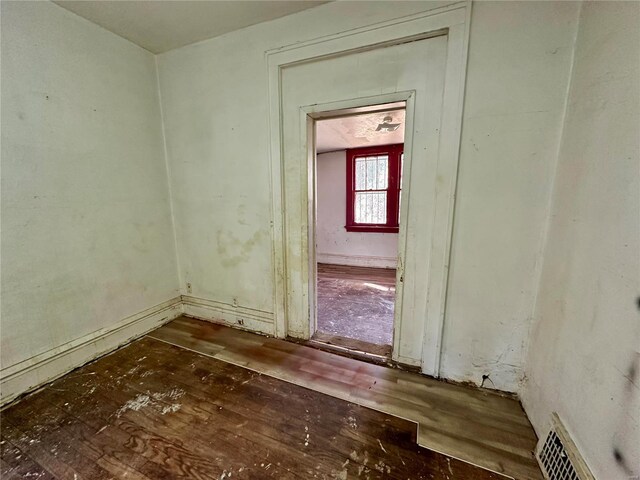 miscellaneous room featuring dark hardwood / wood-style flooring