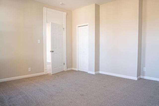 empty room featuring carpet floors