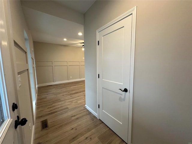 corridor featuring light wood-type flooring