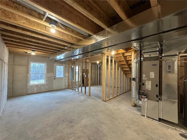 basement featuring heating unit