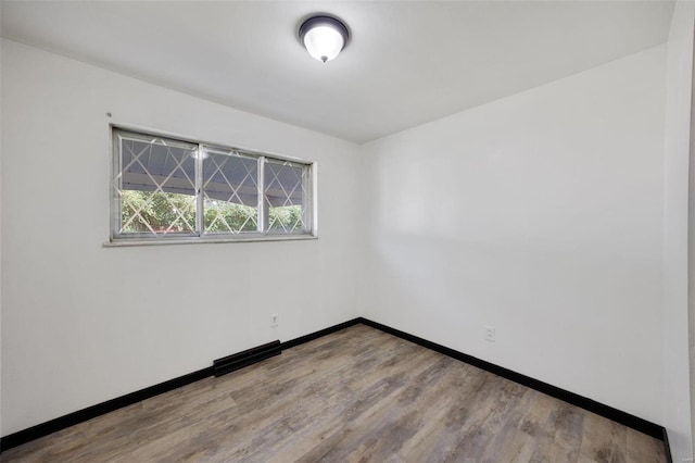 empty room featuring light hardwood / wood-style floors