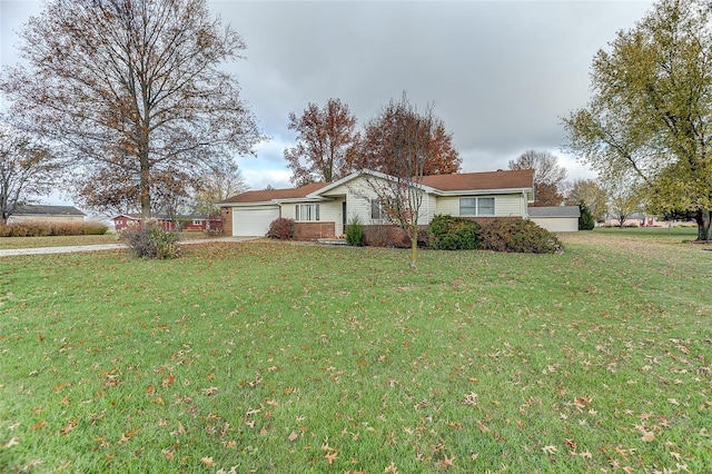 ranch-style home with a front lawn and a garage