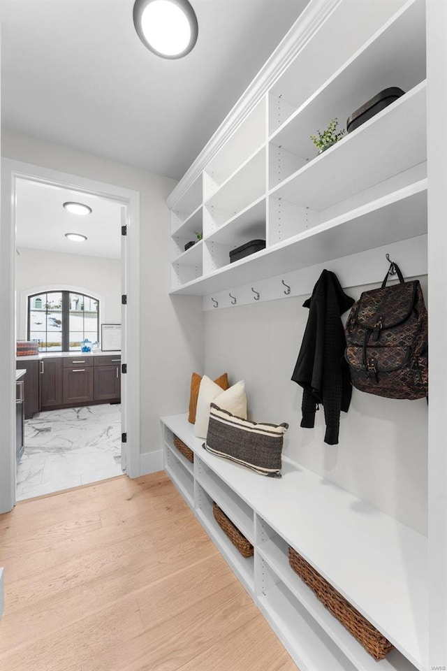 mudroom with light wood-type flooring