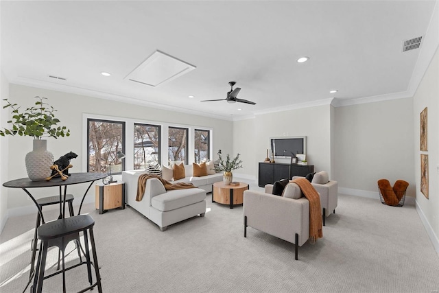 living room featuring light carpet and crown molding