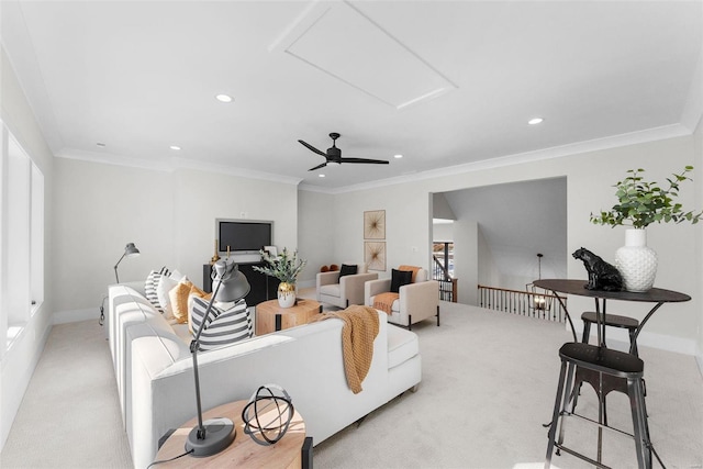 living room with light colored carpet and ornamental molding