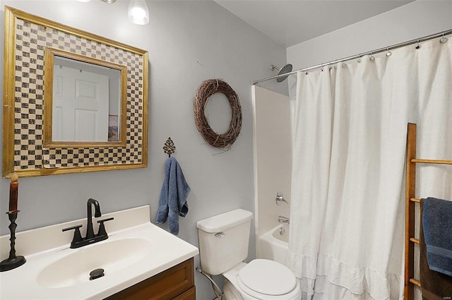 full bathroom featuring vanity, toilet, and shower / bathtub combination with curtain