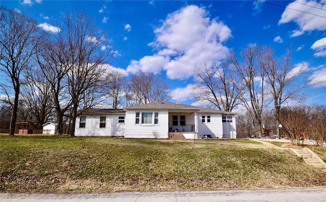 single story home with a front lawn and a porch