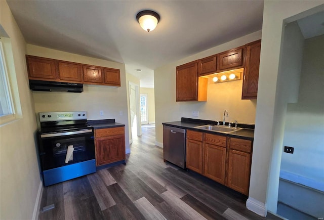 kitchen featuring dark hardwood / wood-style flooring, sink, and stainless steel appliances