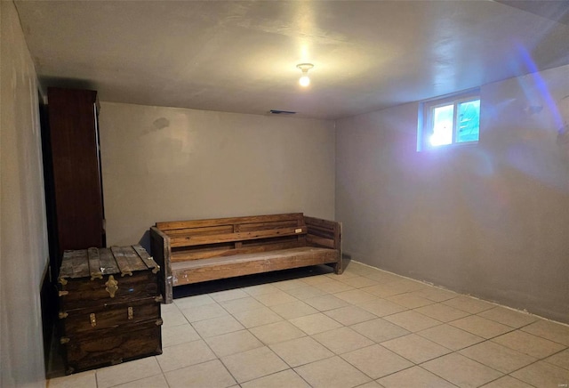 sitting room featuring light tile patterned flooring