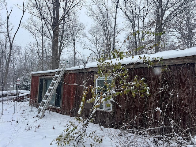 view of snow covered property