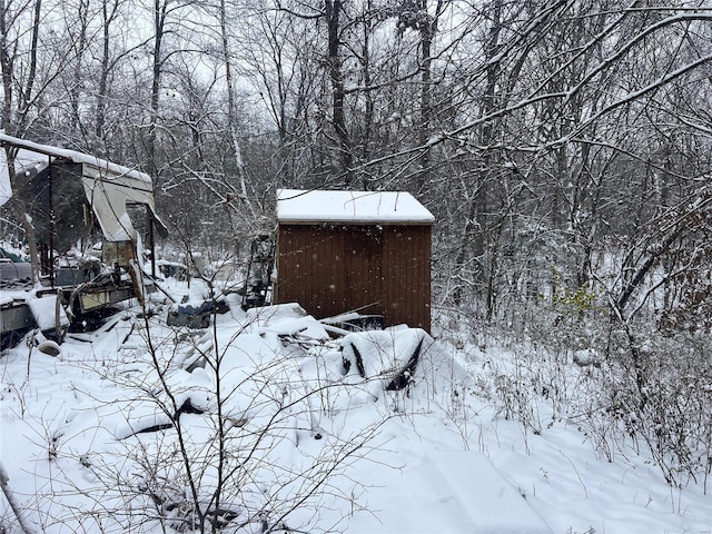 view of yard covered in snow