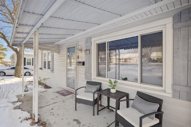 view of snow covered patio