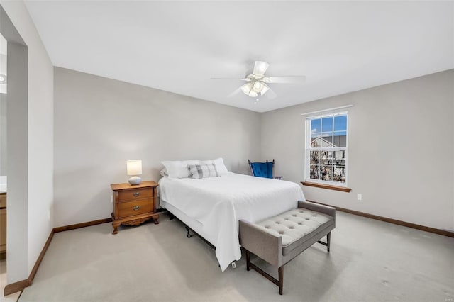 bedroom featuring ceiling fan and light colored carpet