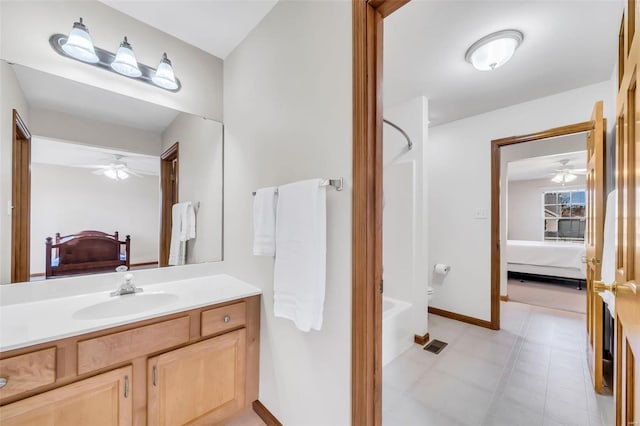 bathroom with shower / bathing tub combination and vanity