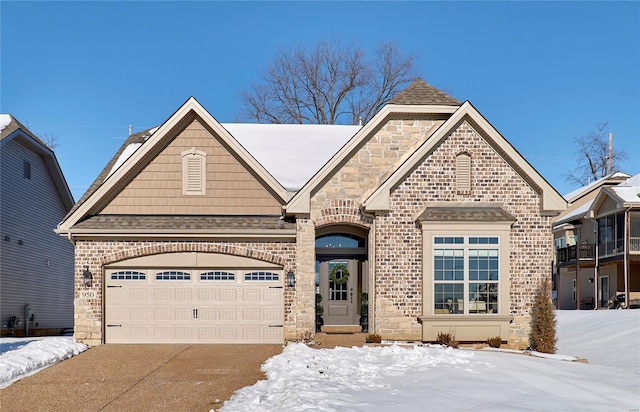 view of front of property with a garage