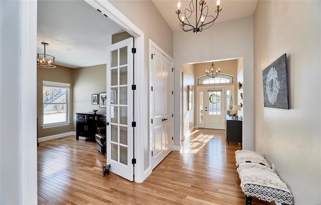 entryway featuring light hardwood / wood-style floors and a healthy amount of sunlight