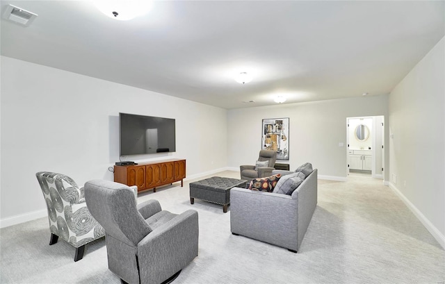 living room featuring light carpet