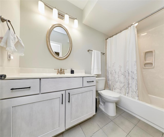 full bathroom with shower / tub combo, vanity, toilet, and tile patterned floors