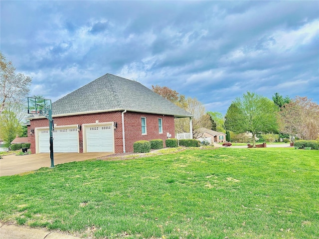 view of property exterior with a yard and a garage