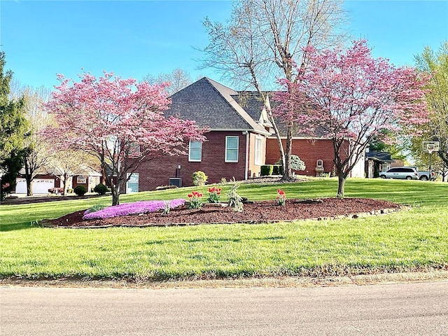 view of front of house with a front lawn