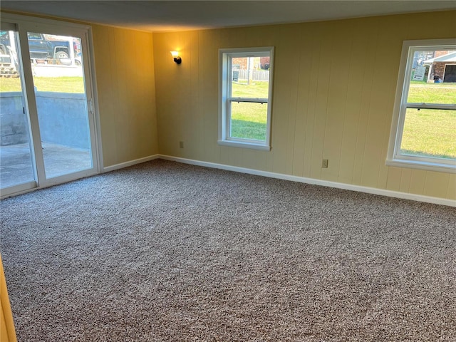 empty room with carpet flooring