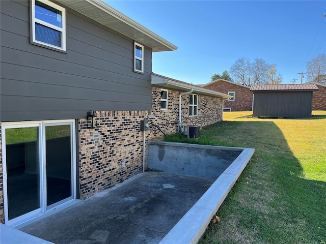 view of yard with a patio area and a shed