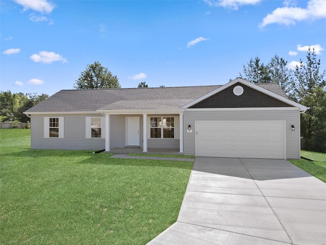 single story home featuring covered porch, a garage, and a front yard