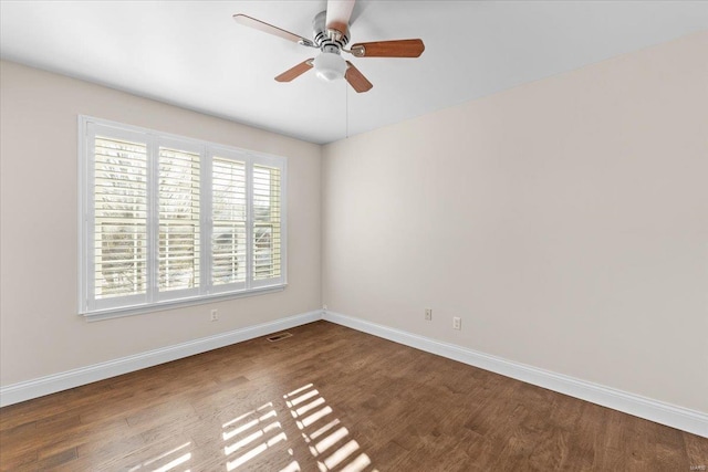 unfurnished room featuring ceiling fan and hardwood / wood-style floors