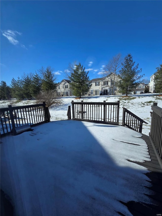 view of snow covered deck