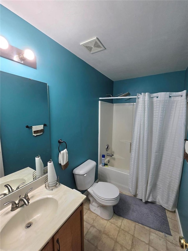 full bathroom featuring toilet, vanity, and shower / bath combo