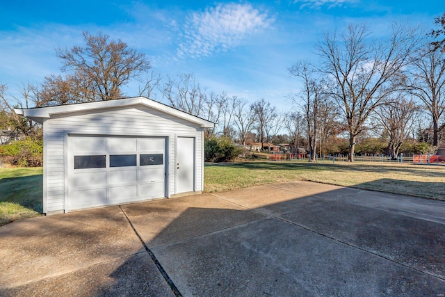 garage with a lawn