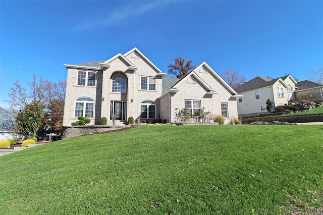 view of front of house featuring a front lawn