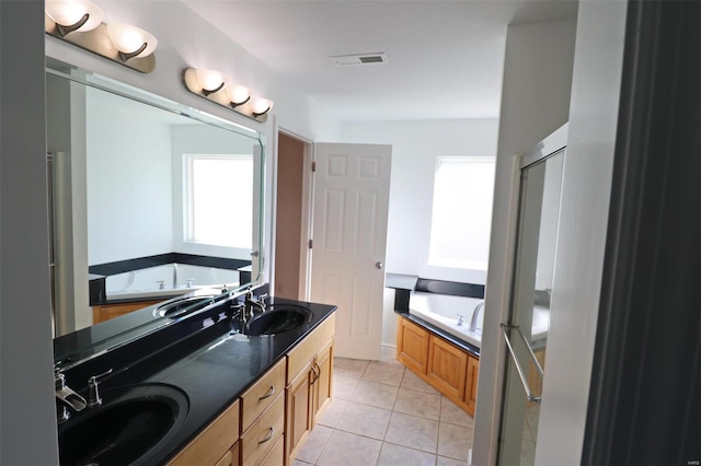 bathroom with vanity, tile patterned floors, and separate shower and tub