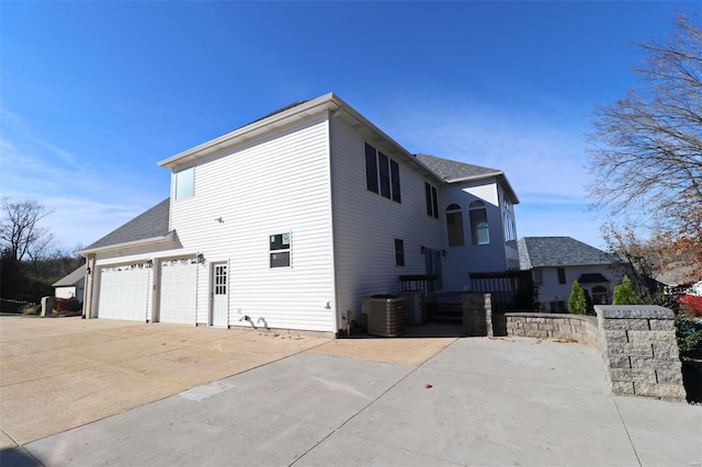 view of side of home featuring central air condition unit