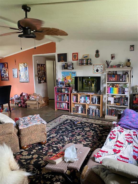 living room with ceiling fan