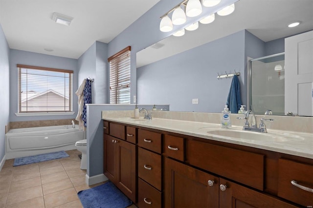 full bathroom with separate shower and tub, tile patterned flooring, vanity, and toilet